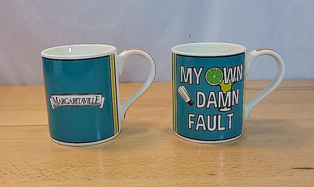 Lorrie Veasey Coffee mug MARGARITAVILLE Buffett Set of 2 OUR NAME IS MUD
